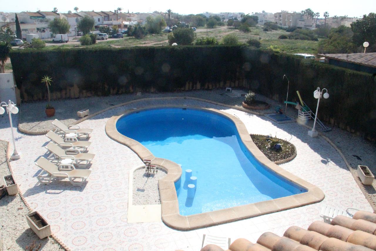 itsh 1739207069YNKORD ref 1828 mobile 17 View of the pool from above Playa Flamenca